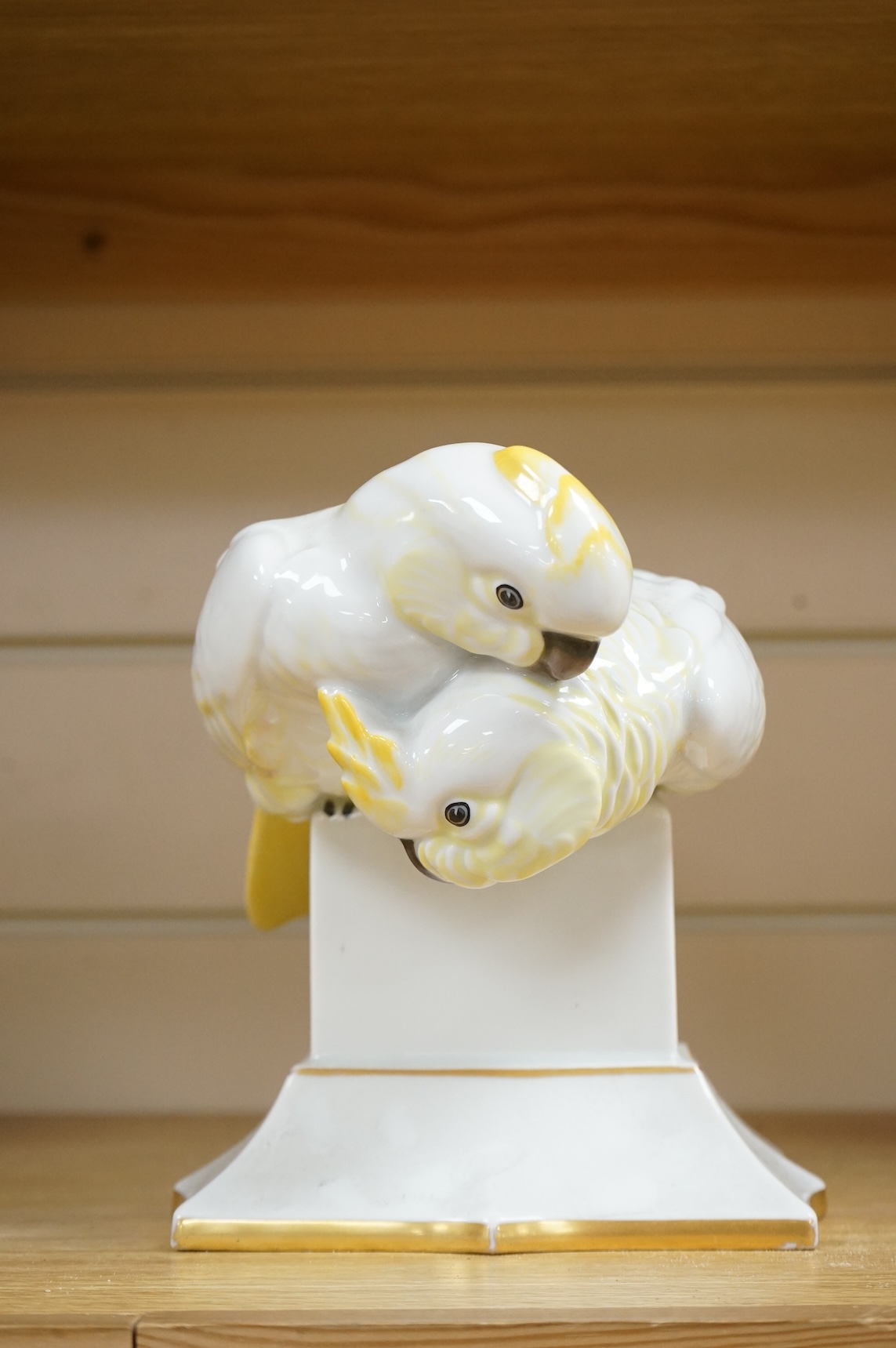 A Lorenz Hutschenreuther porcelain figure group of two cockatoos, stamped to the base, 19cm high